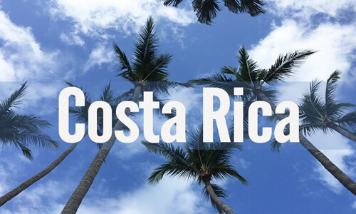 Picture of a sign with the words “Costa Rica” in beautiful San José, Costa Rica.  The top word are in white color.
